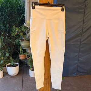 Fabletics Cream High-Waisted Leggings with Side Pockets